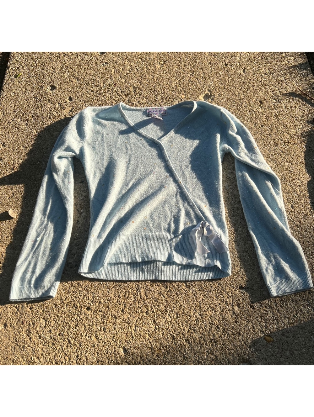 Y2K bedazzled whimsical light blue crossover sweater